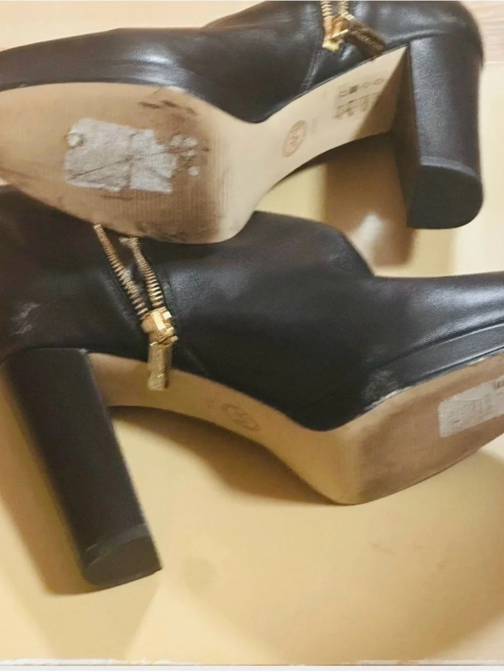 Michael Kors Sammy Platform Black Leather Ankle Booties with Gold Zipper.